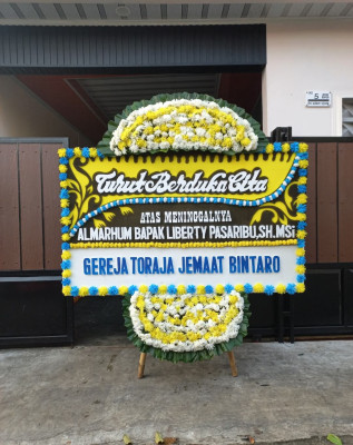 Papan Bunga Duka di Aertembaga